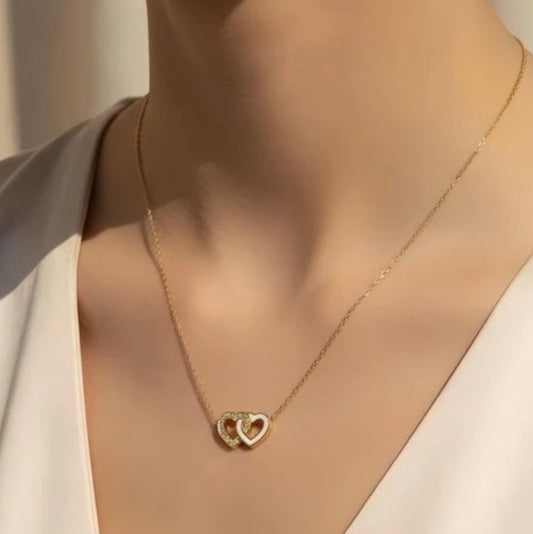 Ensemble cœurs entrelacés - Collier et bracelet dorés